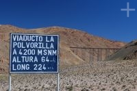 Sign describing the La Polvorilla ("Tren a las Nubes") rail bridge, Salta province, Andean Altiplano, Argentina